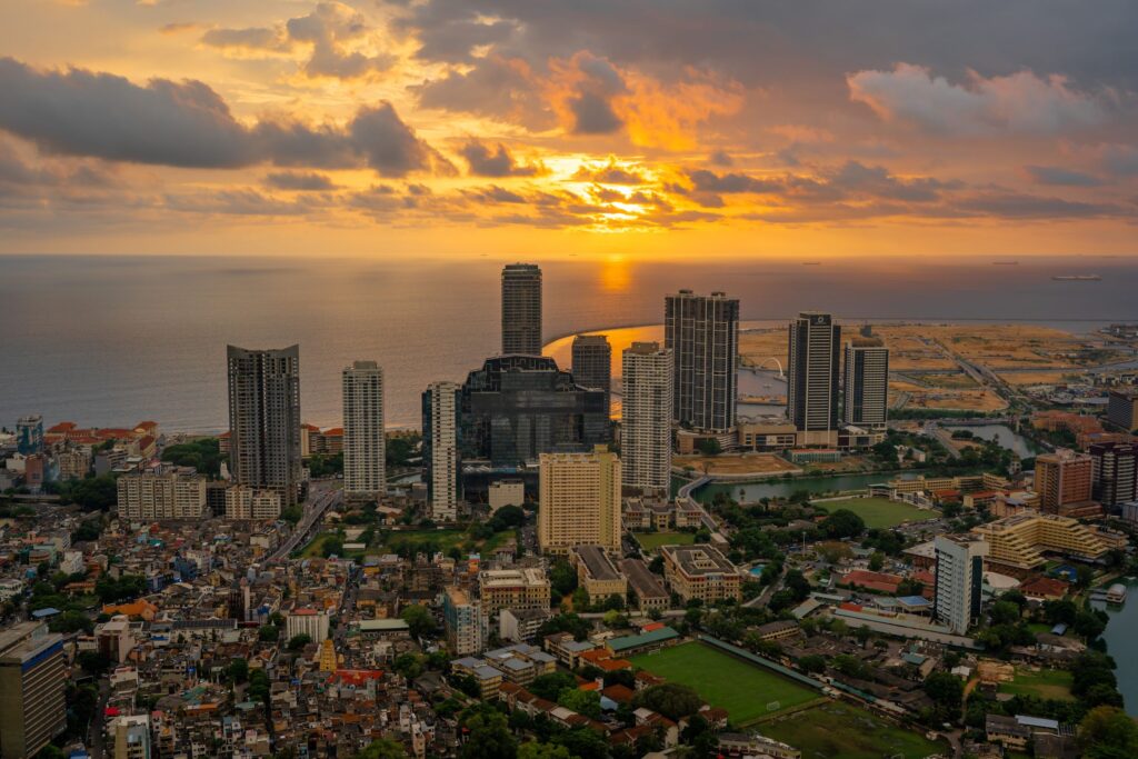 The Colombo skyline at sunset with the sea beyond